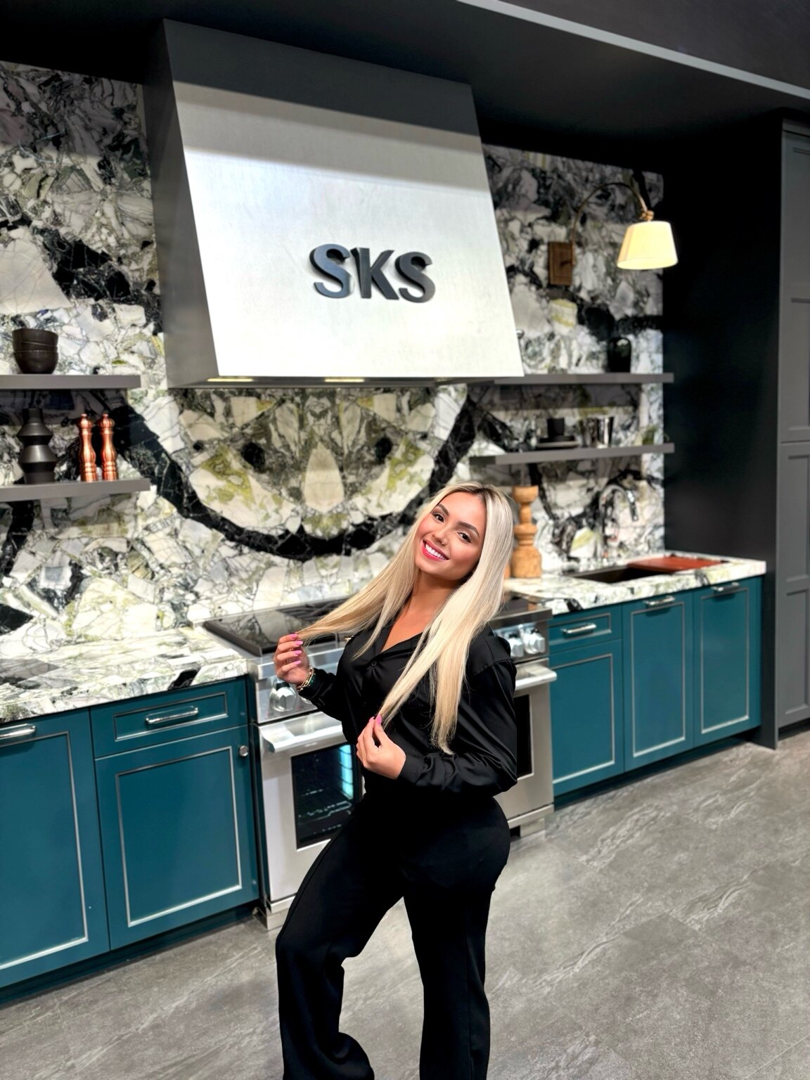 Luana Moa representing LG and SKS in a luxury appliance showroom